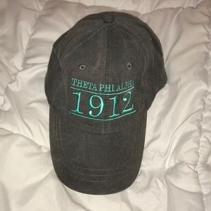 Theta phi alpha baseball cap